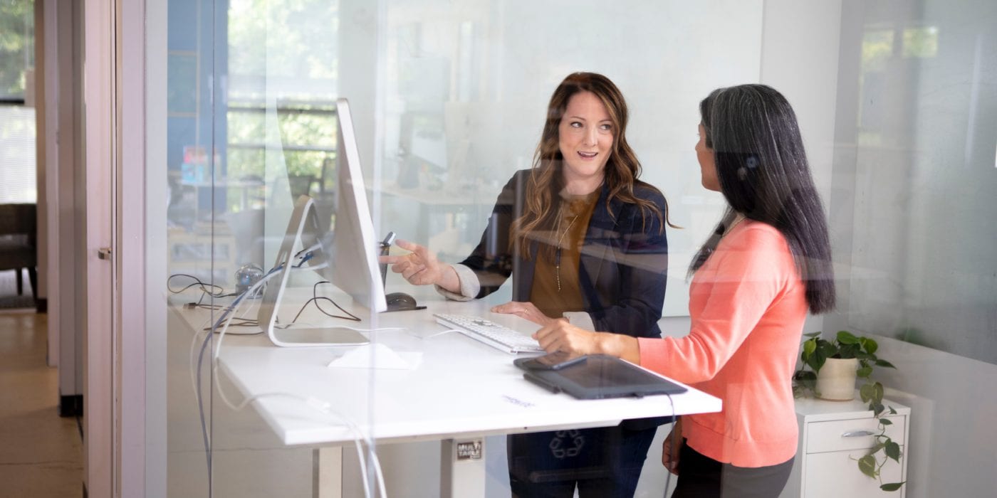 Two women collaborating in the office
